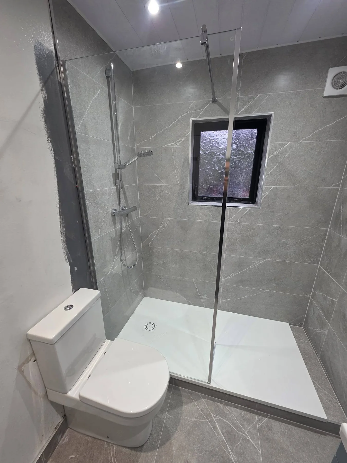 Completed bathroom photograph 2 of Grey Marble-Effect Walk-In Bathroom