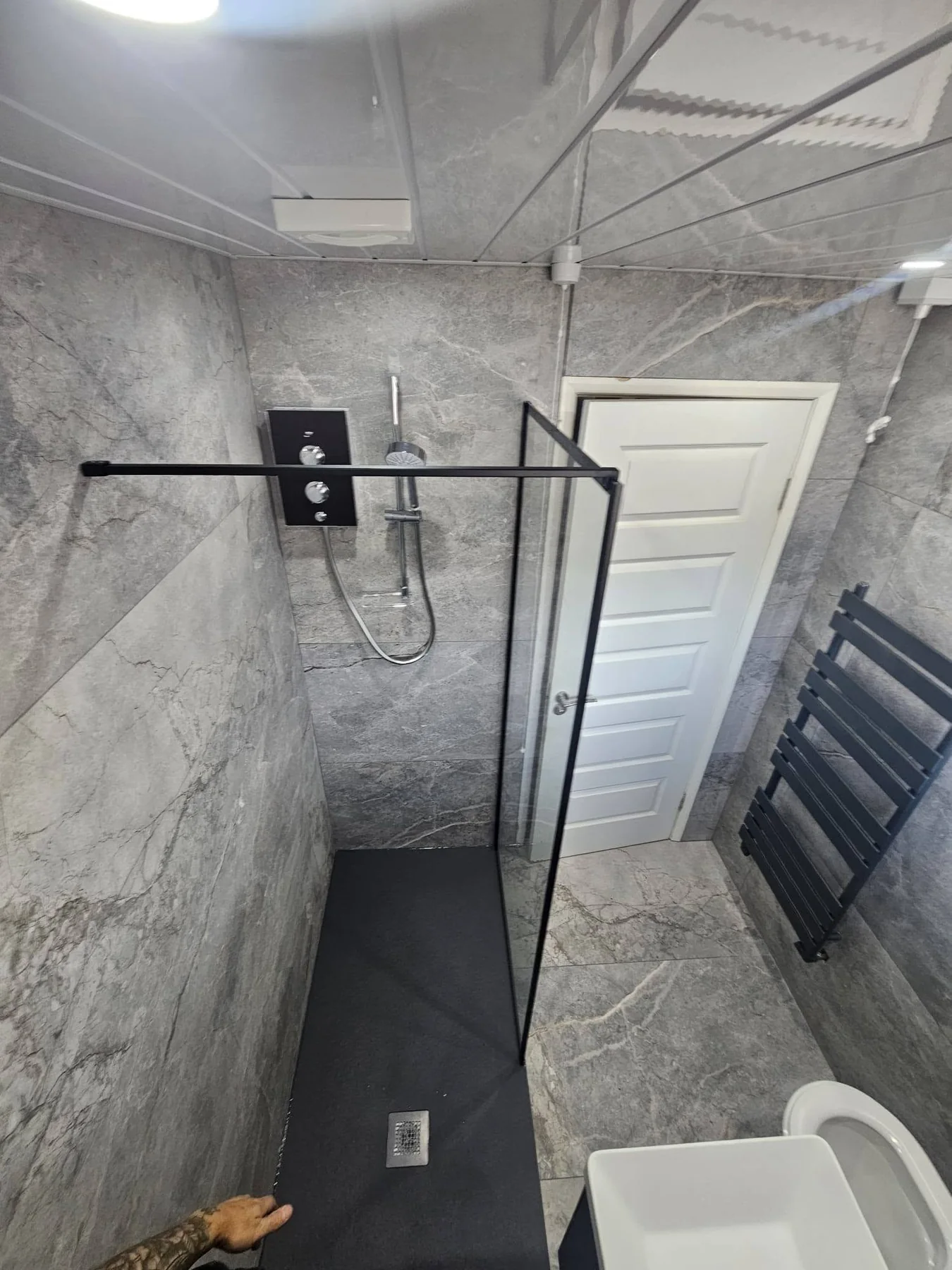 Completed bathroom photograph 3 of Monochrome Stone-Effect Shower Room