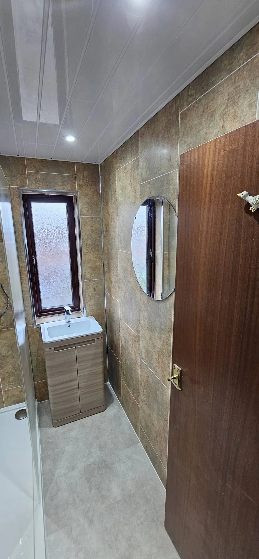 Completed bathroom photograph 2 of Narrow Bathroom Bath-to-Shower Upgrade
